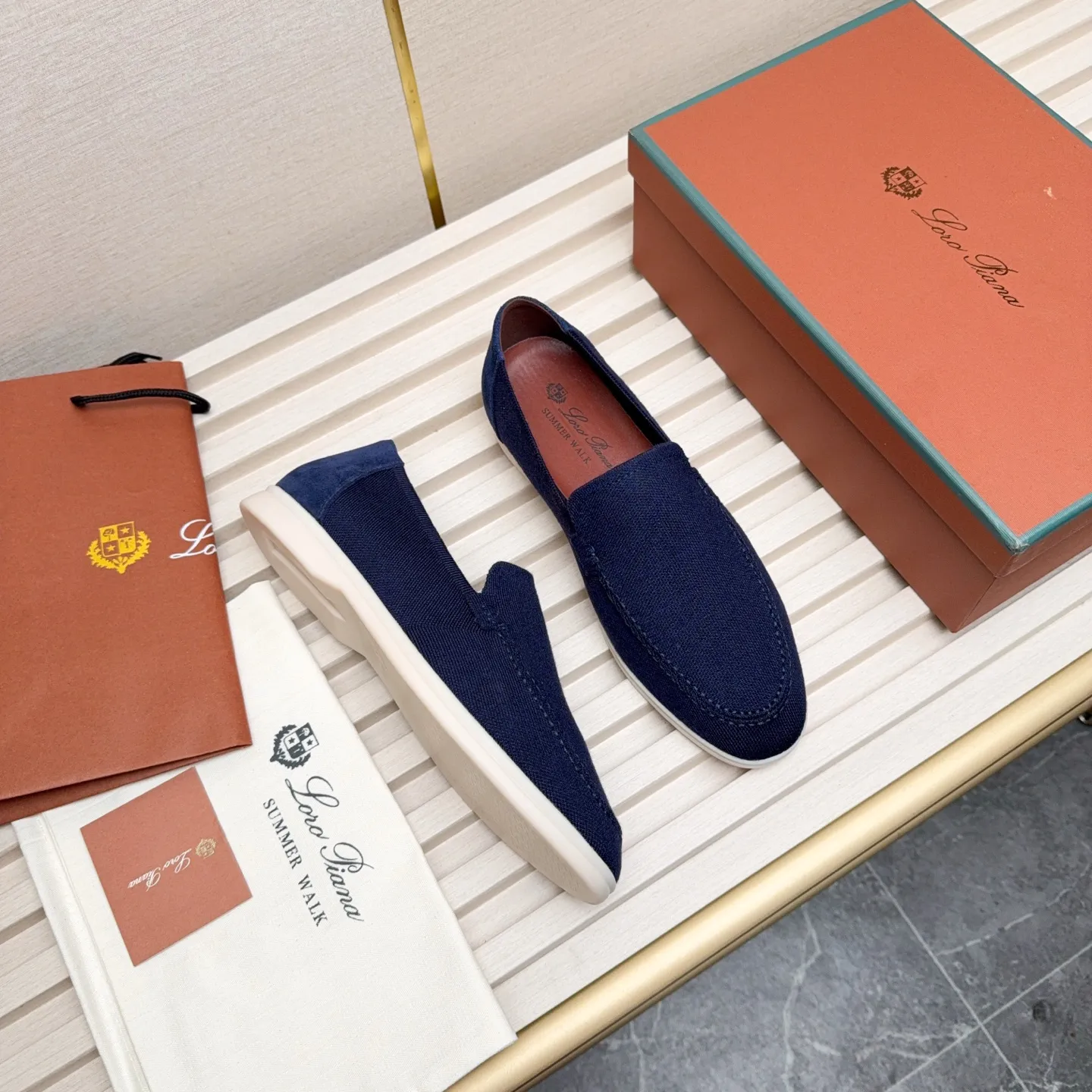 Men's Men's Shoes 💰400 Loro PIana moccasins are made of wish wool fabric. The upper is made of knitted fabric, made on a loom, and then attached to a rubber sole. The Rain System's water-repellent treatment enhances the shoe's functional design, while the suede details give the shoe a sense of elegance and sophistication. Made from Wish, fine wool from Australian and New Zealand Merino sheep